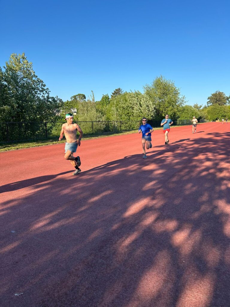 Jacob Haas running mile time trial with Island Endurance running group in Oak Bay Victoria BC in Altra Escalante zero drop shoes